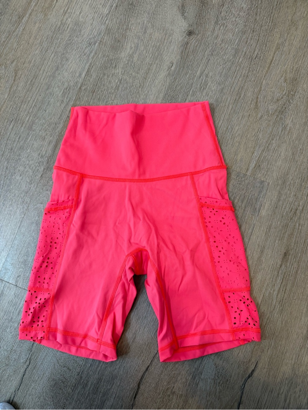 aerie High-Waist Laser-Cut Bike Shorts in Neon Pink